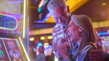 couple playing slots